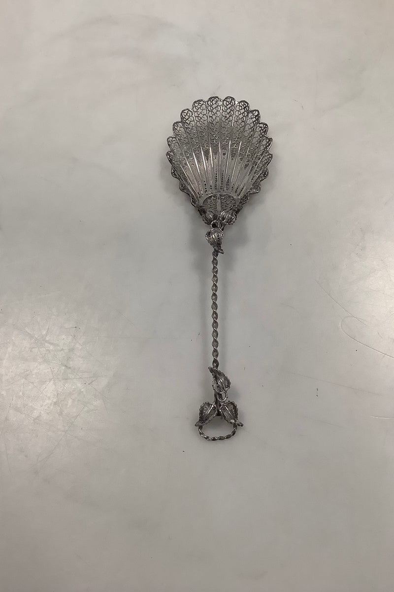 Filigree silver spoon with ornamentation