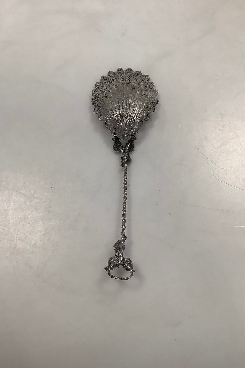 Filigree silver spoon with ornamentation