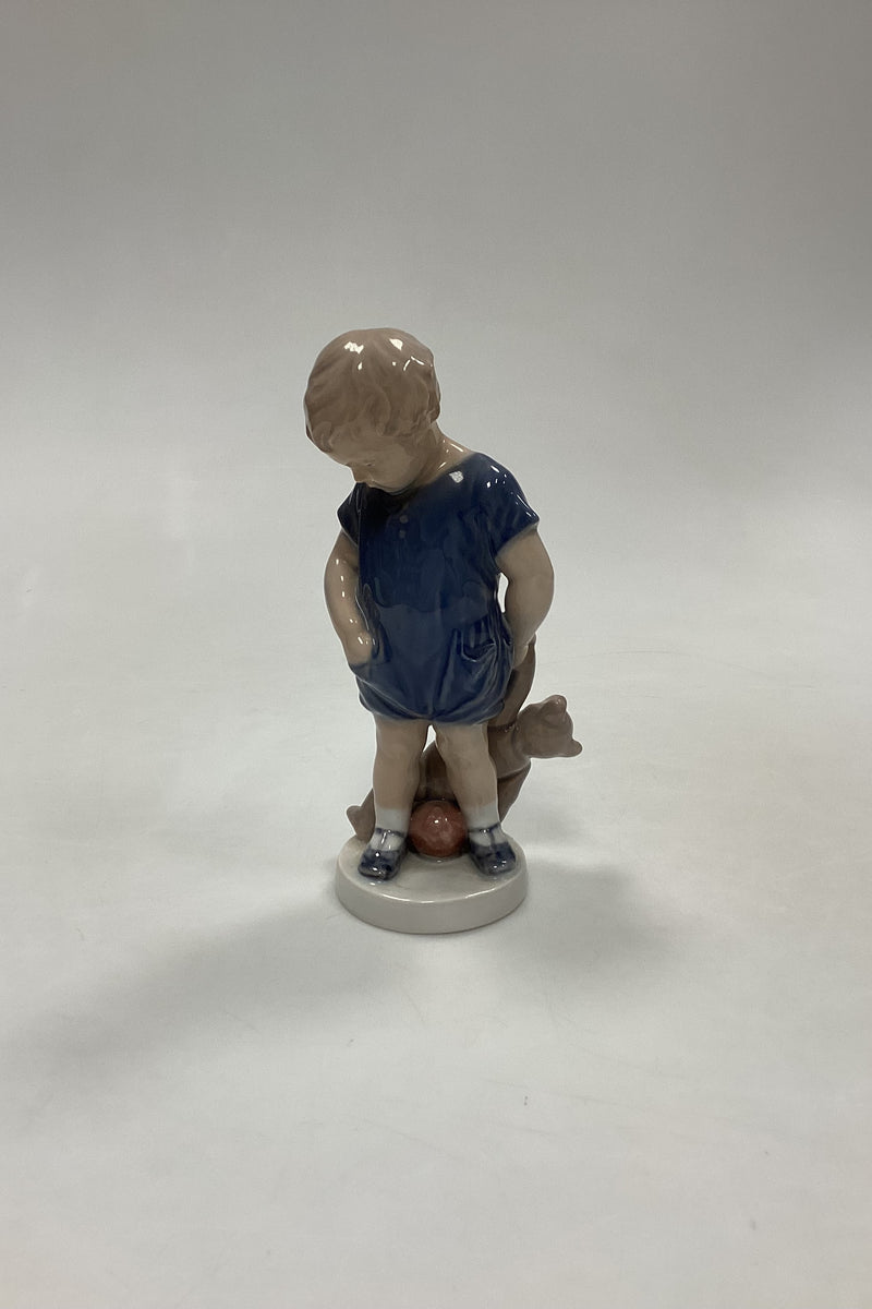 Royal Copenhagen Figurine of Boy with Teddy Bear No 3468