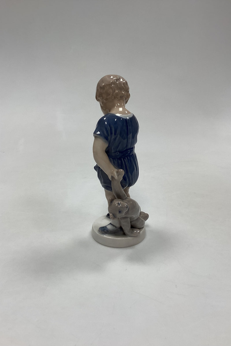 Royal Copenhagen Figurine of Boy with Teddy Bear No 3468