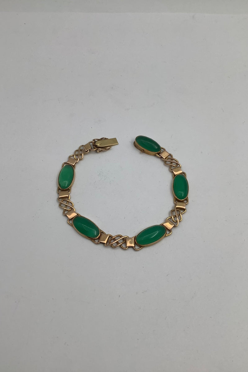 14 karat gold bracelet with green stones